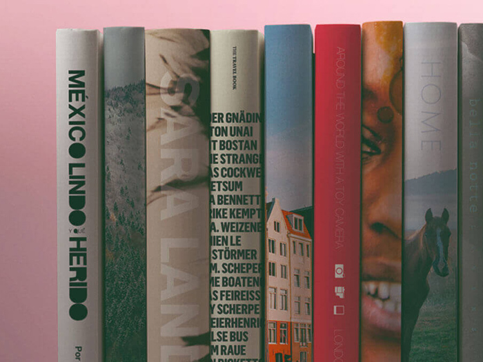 A collection of books standing up against each other