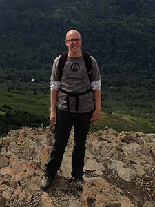 Eric Swanson standing on mountain